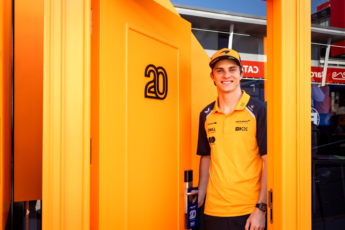 Signature papaya-colored orange door at the 2025 Spanish Grand Prix in Barcelona